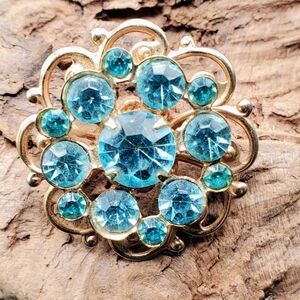 Vintage Floral Rhinstone Brooch In Gold-Tone With Blue Rhinestones